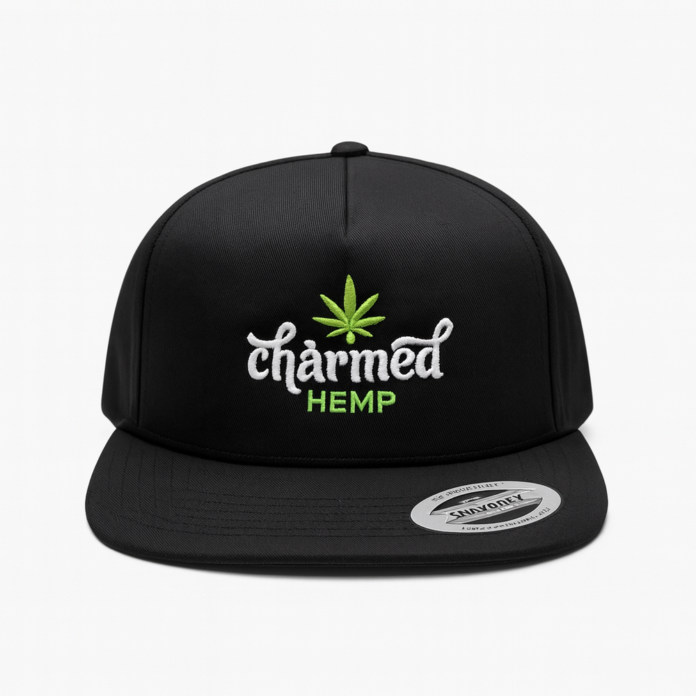 Black cap with 'charmed HEMP' logo on a white background